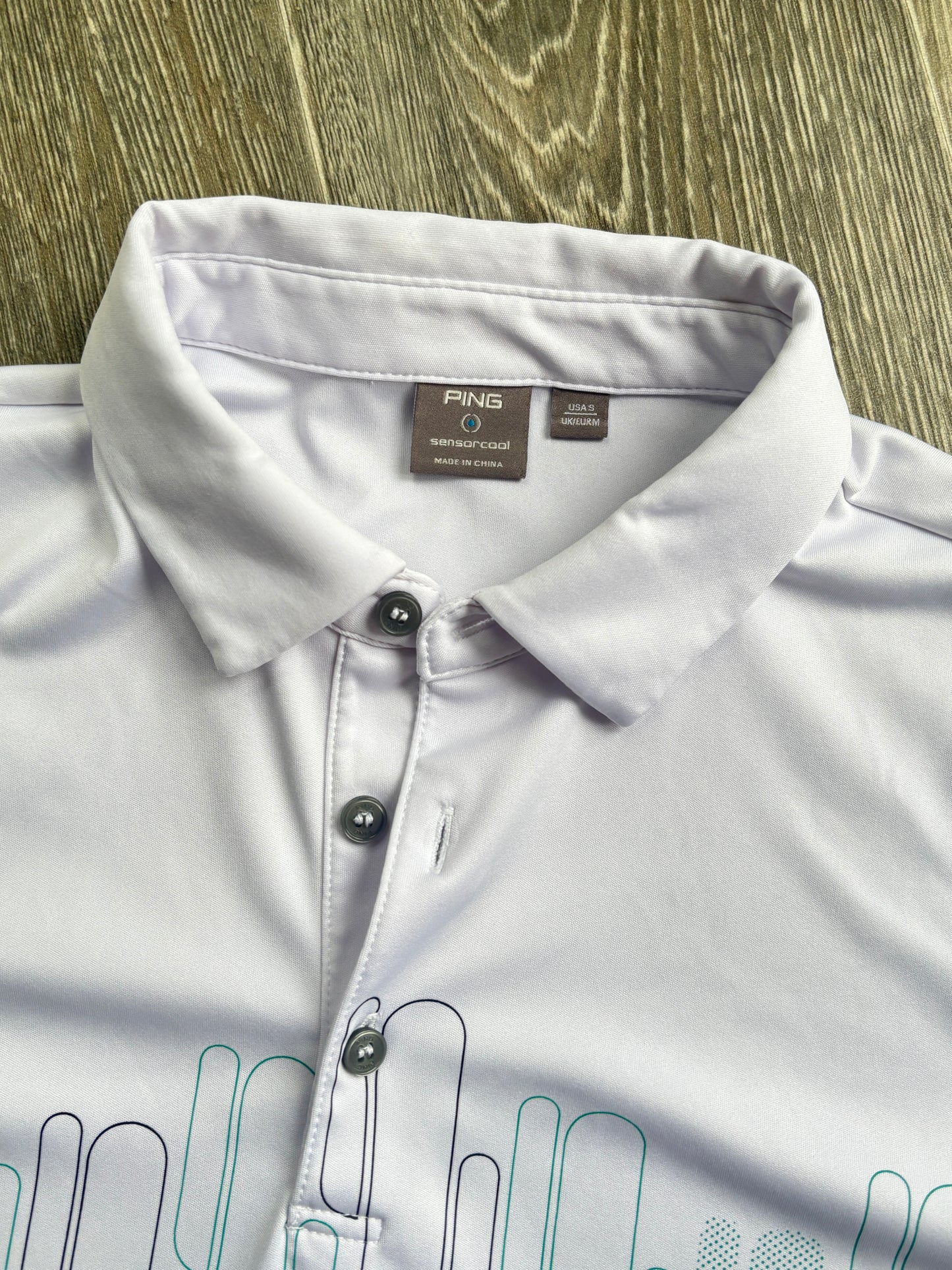 Ping golf polo.